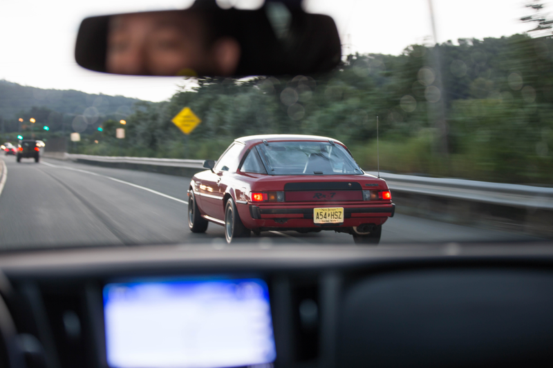 Illustration for article titled The Original Mazda RX-7 Drives Like a Humming, Thrumming, Living Animal